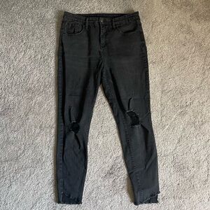 Black distressed ankle cut jeans